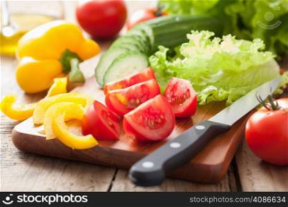fresh vegetables cucumber tomatoes pepper and salad leaves