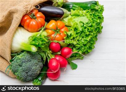 fresh vegetables in a burlap sack