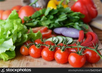 fresh vegetables. Included are tomatoes, cucumber, onions and green leaves