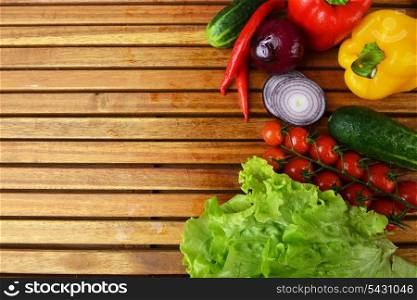 fresh vegetables. Included are tomatoes, cucumber, onions and green leaves
