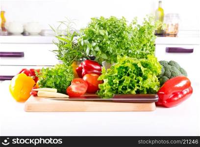 fresh vegetables on the table in the kitchen