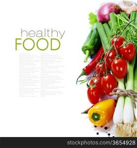 fresh vegetables on the white background - healthy or vegetarian eating concept (with easy removable sample text)