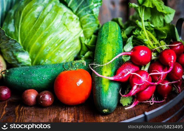 Fresh vegetables on wooden background