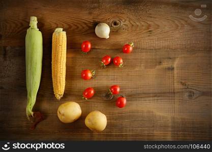 Fresh vegetables on wooden boards. Top view.