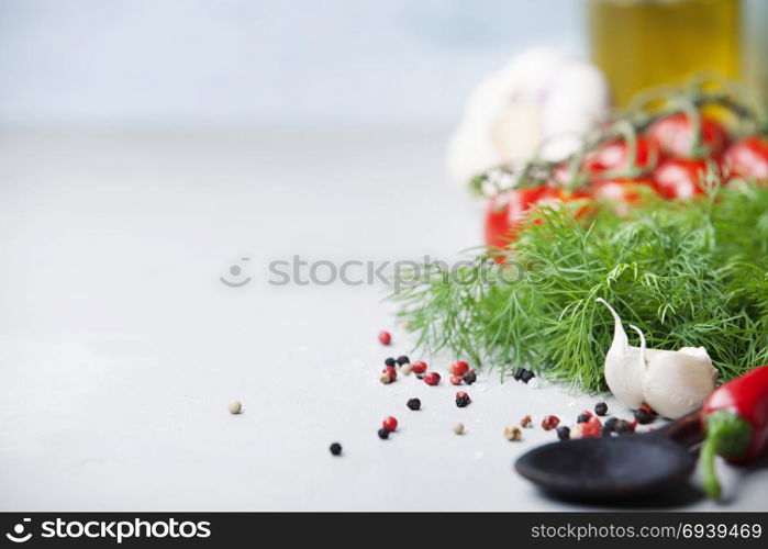 Fresh vegetables over concrete background with space for text