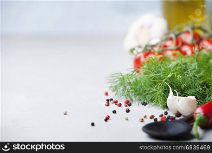 Fresh vegetables over concrete background with space for text