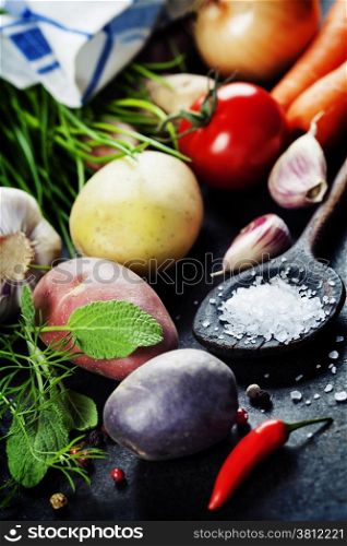 Fresh vegetables (potato, onion, carrot) ready for cooking. Health, vegetarian food or cooking concept. Fresh organic vegetables. Food background. Healthy food from garden