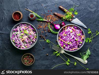 Fresh vegetables salad with purple cabbage and carrot.Coleslaw salad. Red kraut salad