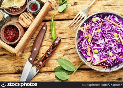 Fresh vegetables salad with purple cabbage.Coleslaw in a bowl. Red cabbage salad