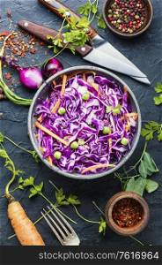 Fresh vegetables salad with red cabbage.Coleslaw in a bowl. Salad with red cabbage and carrots