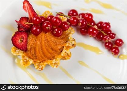 fresh vegetarian sweet pastry with berry and pumpkin
