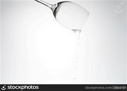 fresh water spilling from glass