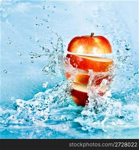 fresh water splash on red apple