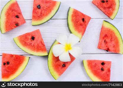 Fresh watermelon slice texture background / Watermelon seamless summer fruit and white flower , top view