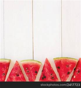 fresh watermelon slices triangular shape wooden plank