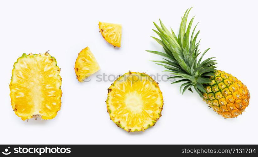 Fresh whole and cut pineapple isolated on white background. Top view