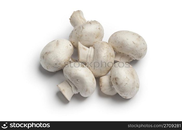 Fresh whole, button mushrooms, champignons, on white background