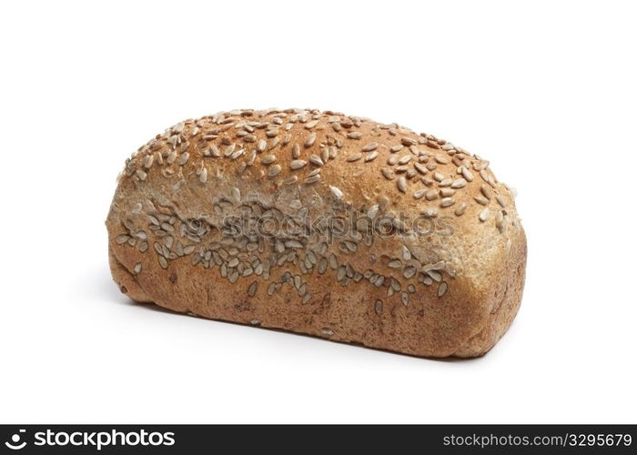 Fresh wholewheat bread with sunflower seeds on white background