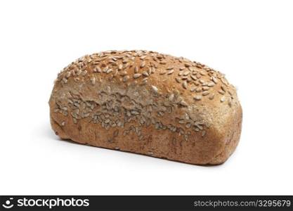 Fresh wholewheat bread with sunflower seeds on white background