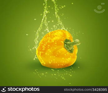 Fresh yellow bell pepper with water splashes on green background.