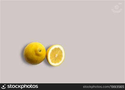 Fresh yellow lemons on a white background for the menu. Geometric background. Flat lay, copy space, top view.