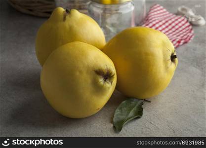 Fresh yellow quinces in the kitchen