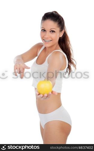 Fresh young woman in underwear with a apple isolated on a white background