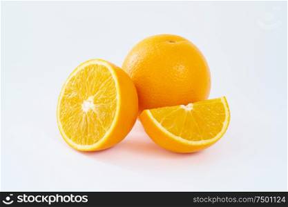 Freshjuicy orange fruit isolated on white background .