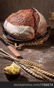 Freshly artisan baked beetroot bread, crunchy bread, country bread. Crispy wheat and rye bread. Simple bread with butter for breackfast