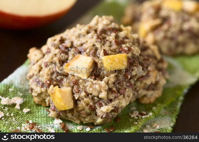 Freshly baked apple, oatmeal and linseed cookies, photographed with natural light (Selective Focus, Focus in the middle of the image)