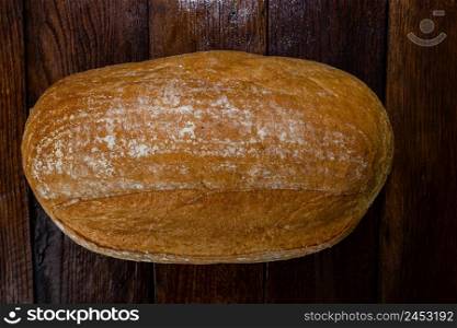 Freshly baked bread on a wooden board. Homemade bread.