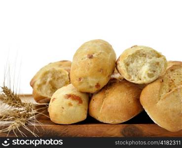 Freshly baked french bread on a wooden board on white background