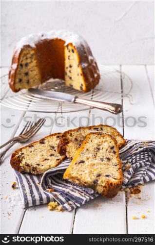 freshly baked gugelhupf on a white background with lavender