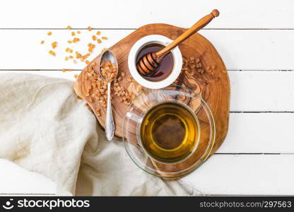 freshly brewed tea on a white background, top view