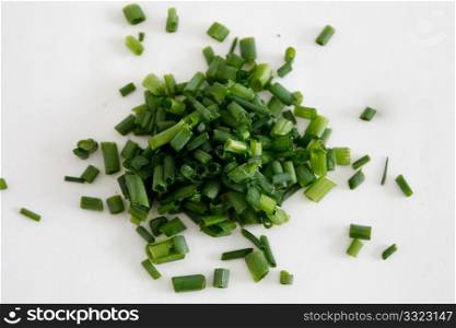 Freshly chopped fragrant chives in a horizontal composition