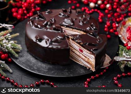 Freshly made delicious chocolate cake on marble table