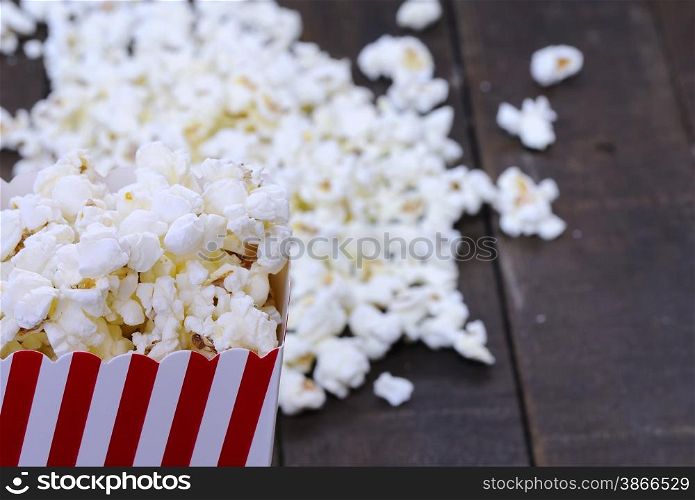 Freshly made popcorn on a wooden table