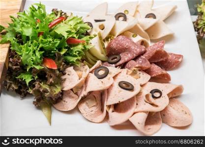 Freshly sliced mixed meat cold cut