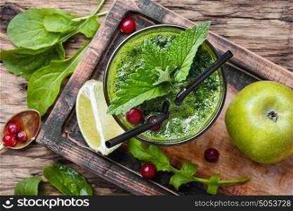 Freshly spinach smoothie. Blended green smoothie drink with spinach and