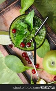 Freshly spinach smoothie. Blended green smoothie drink with spinach and