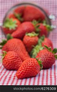 Frest tasty ripe Summer strawberries in glass jar