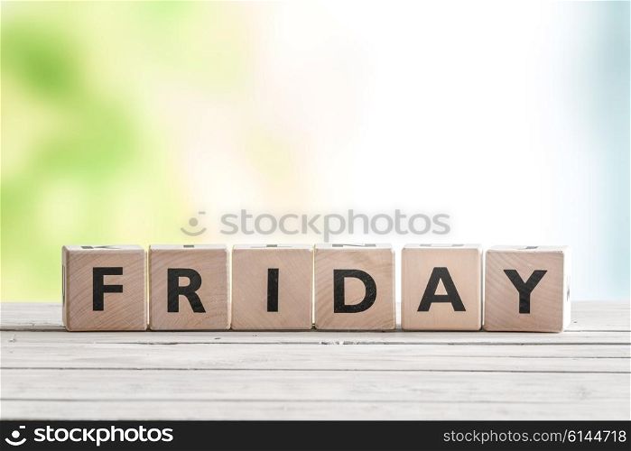 Friday sign with wooden cubes on a table