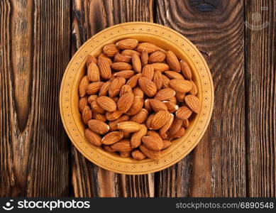 fried almond on plate and on a table