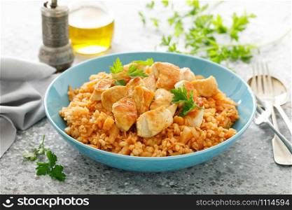 Fried cabbage, bulgur and chicken breast