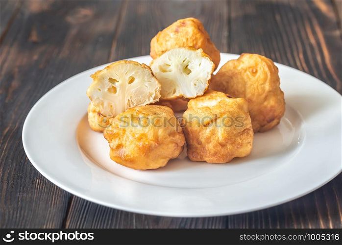 Fried cauliflower coated in batter close-up