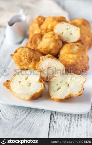 Fried cauliflower coated in batter with close-up