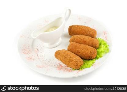fried cheese with bacon at plate with lettuce and sauce on a white