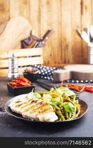 fried chicken breast with green bean on plate