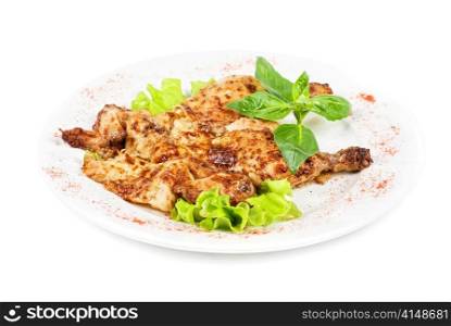 fried chicken filet meat with greens and lettuce
