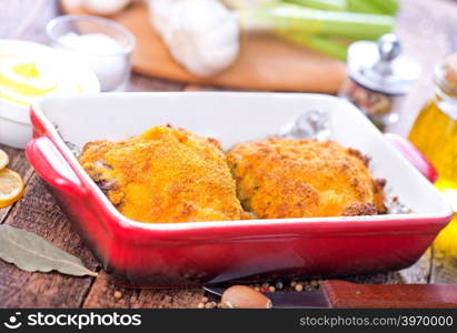 fried chicken in bowl and on a table